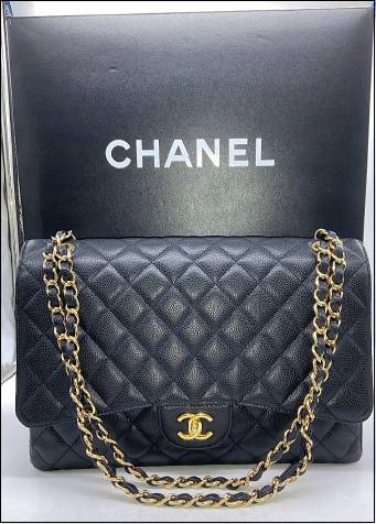 Bonhams : Chanel Black Lambskin Classic Double Flap Bag, c. 1991-94,  (Includes serial sticker, dust bag and box)
